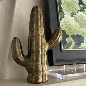 Brass cactus shelf decor